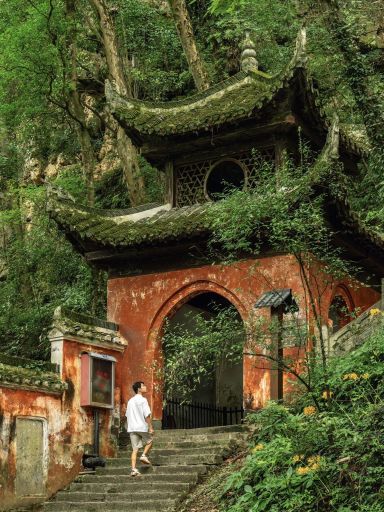 An ancient temple nestled in green trees, a historical site on my Yangtze Delta Adventure.