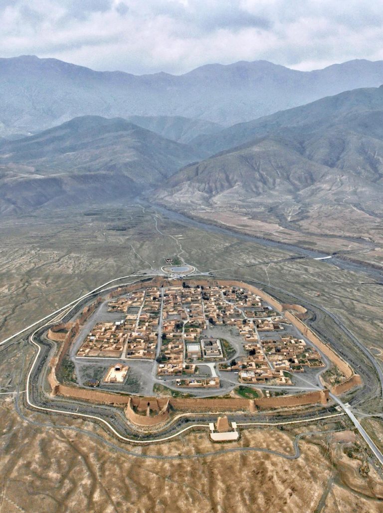 An aerial view of Yongtai Ancient City, shaped like a turtle, a crucial site on the Hexi Corridor Adventure.