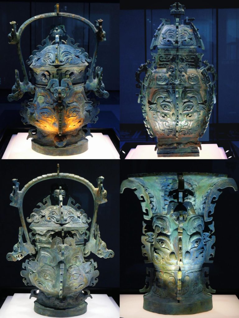 A collection of ancient bronze vessels, representing early Chinese craftsmanship.
