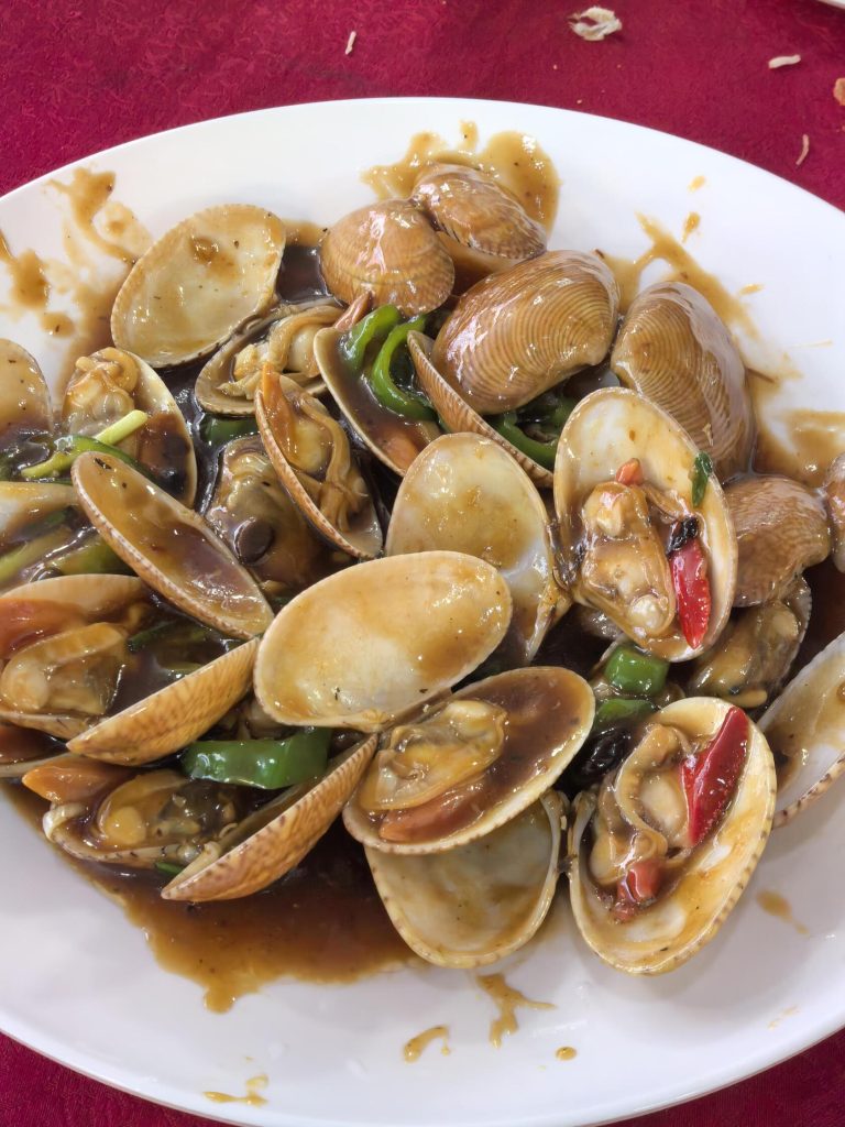 Delicious seafood in Jiangmen, a culinary highlight of the Guangdong Self-Drive Tour.